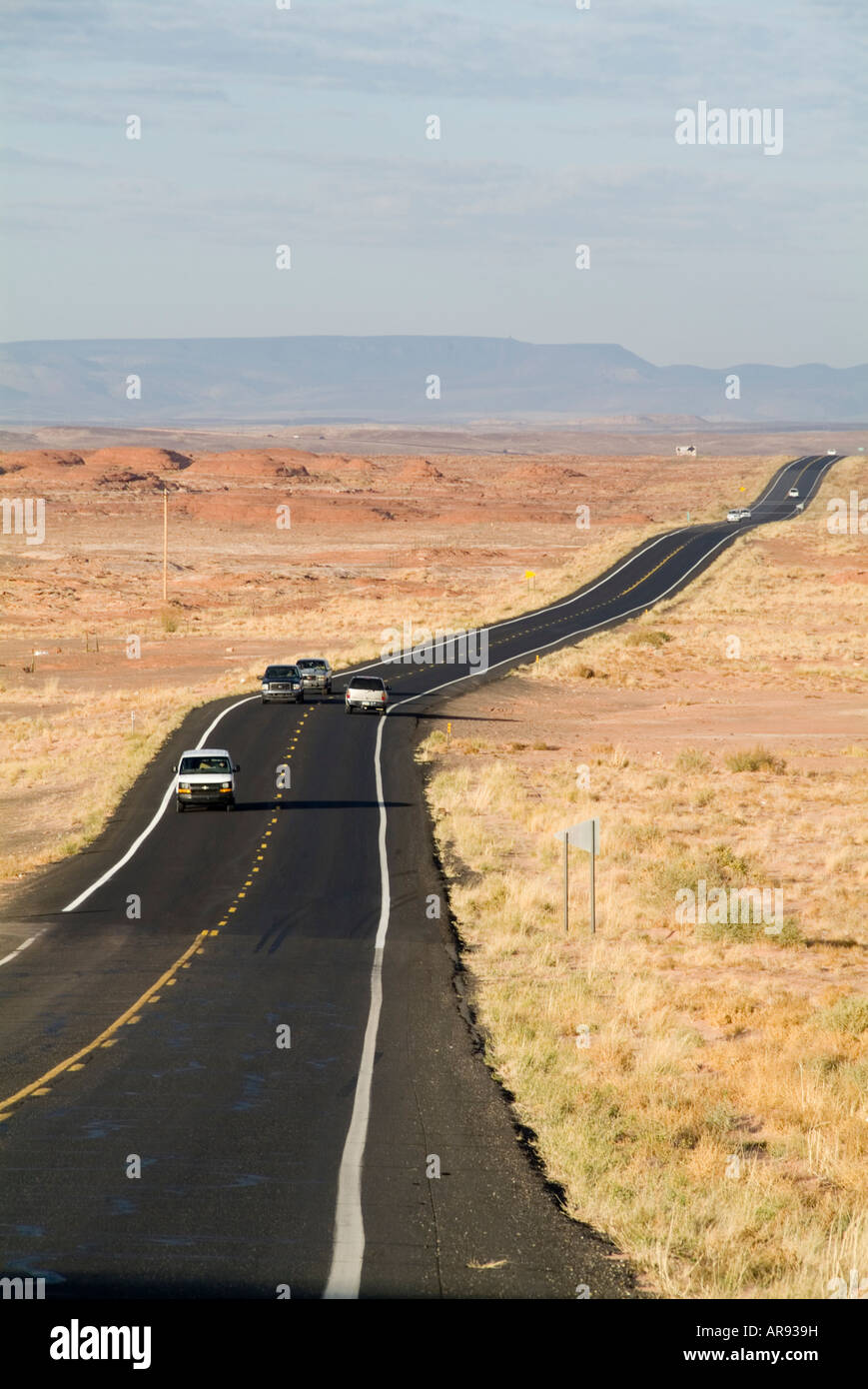 fly drive holiday wide open space desolate road  america american highway long distance driving in open long wide space usa us u Stock Photo