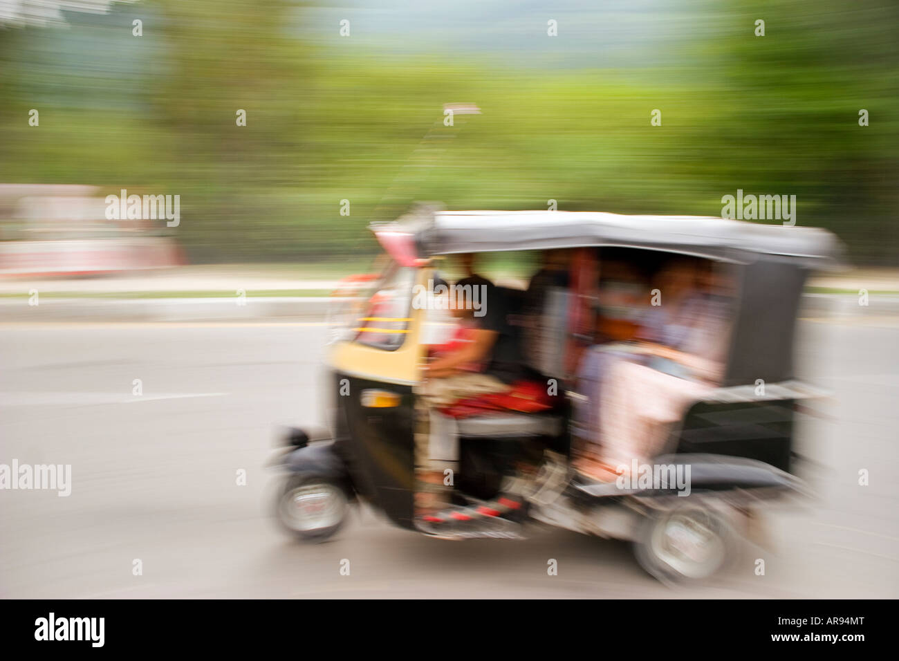 Speeding rickshaw hi-res stock photography and images - Alamy
