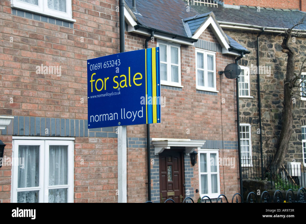 New House for sale sign Llanfyllin village north Powys February 2008