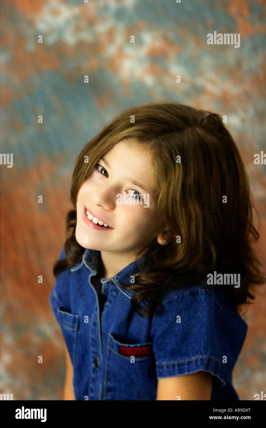 A young girl smiling at the camera Stock Photo