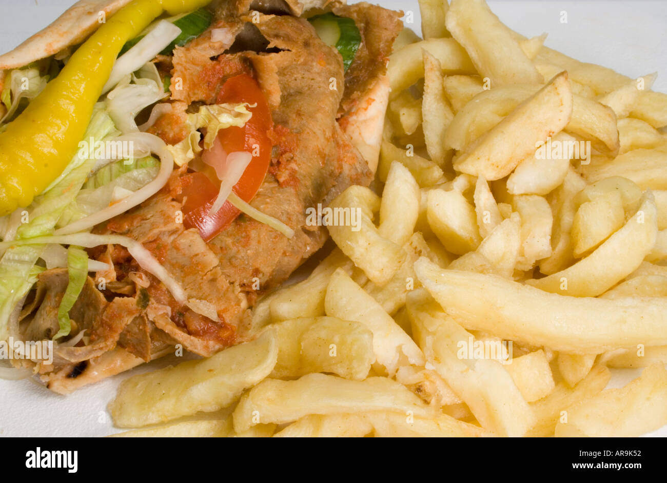Lamb doner kebab in pitta with salad and chips Stock Photo 5218129 Alamy