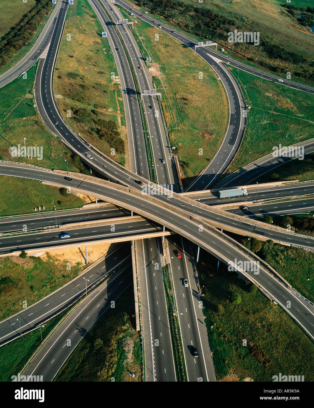 aerial view of motorway freeway roads junction on M25 in the UK England traffic cars lorries spaghetti Stock Photo
