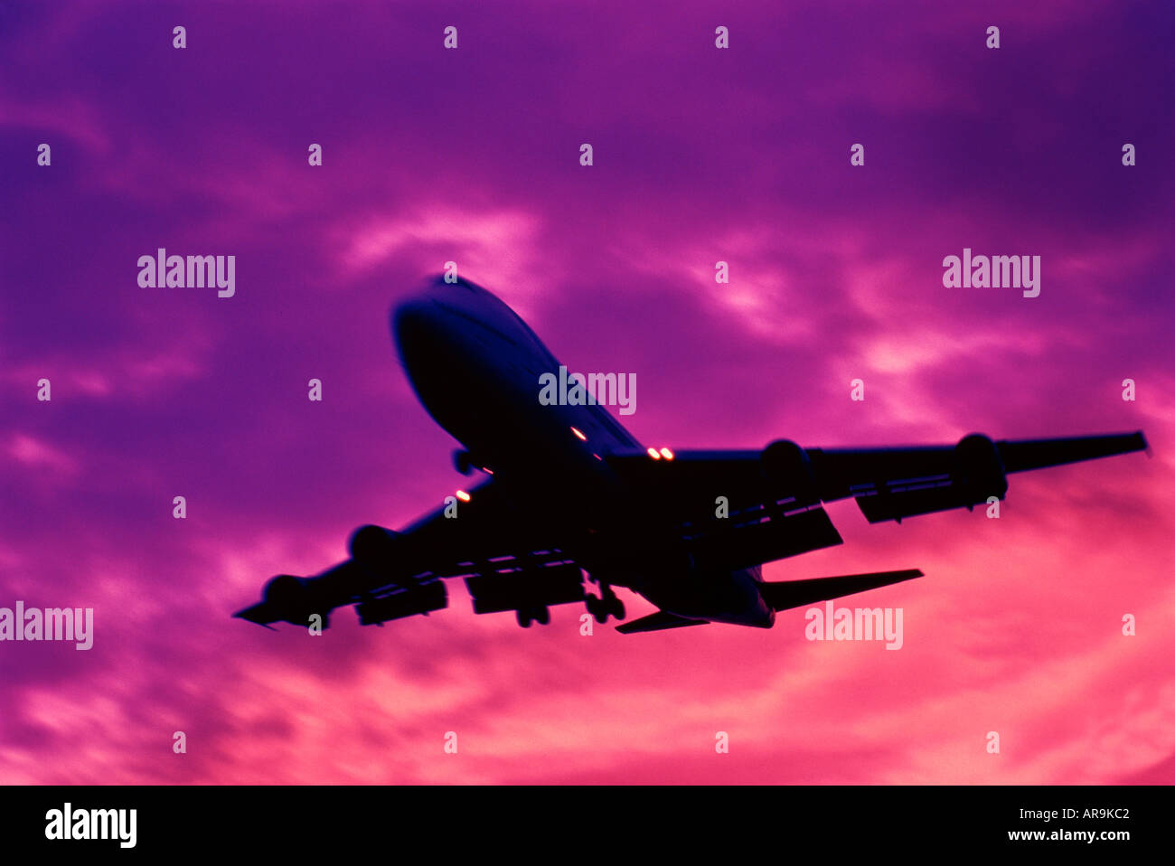 Boeing 747 jumbo jet airliner flying in the air Stock Photo