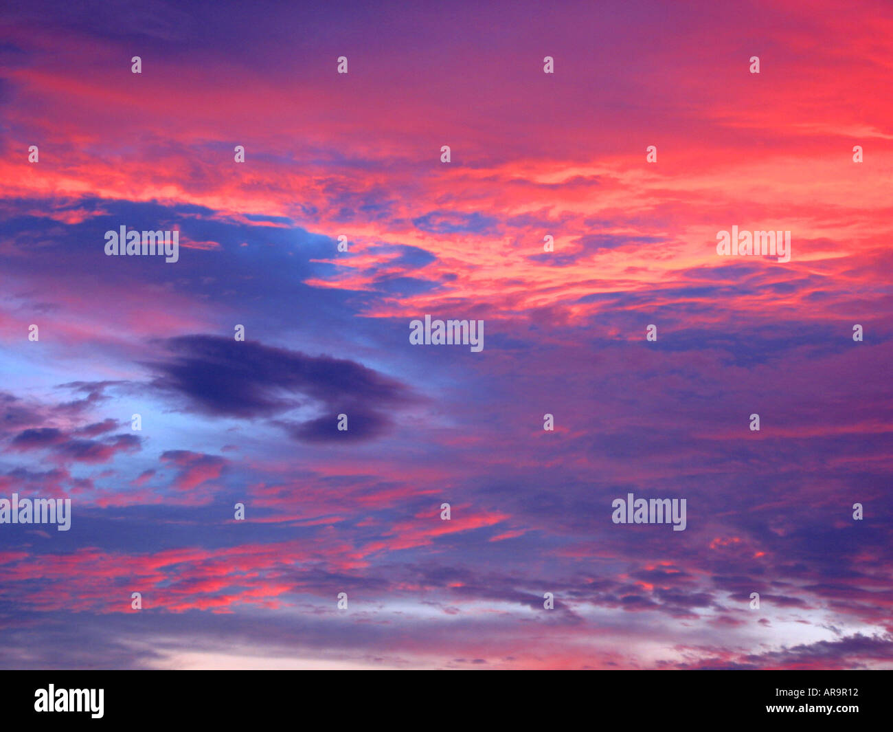 SBD72734 Beautiful colors of sunset sunrise dawn dusk evening morning red reddish grey orange orangish blue yellowish pinkish Stock Photo