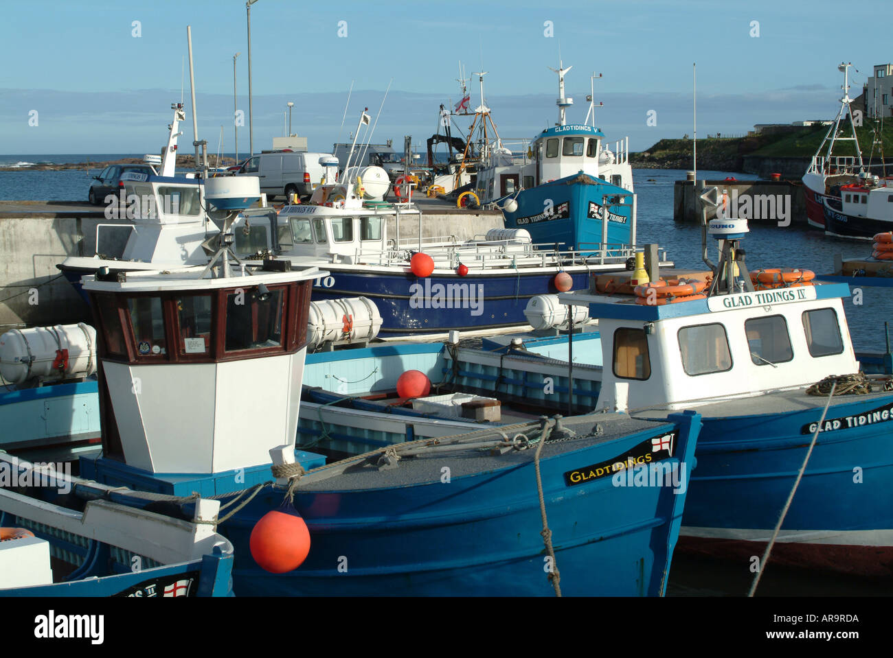 Fishing Boats and Leisure Craft at Seahouses Harbour Northumberland England United Kingdom UK Stock Photo
