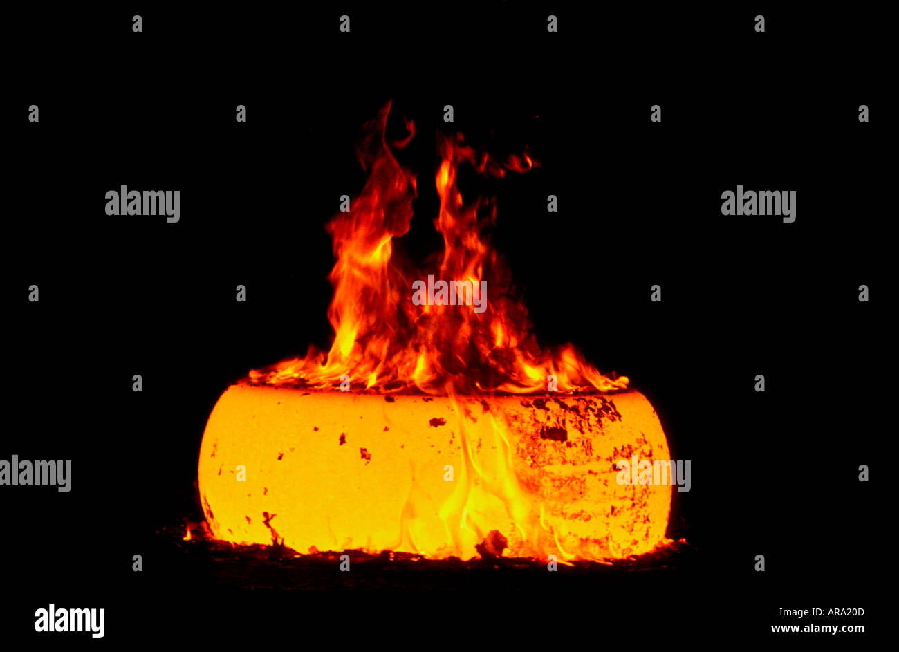 MOLTEN STEEL INGOT Freshly pressed molten steel ingot in British steel works Llanwern Wales Stock Photo