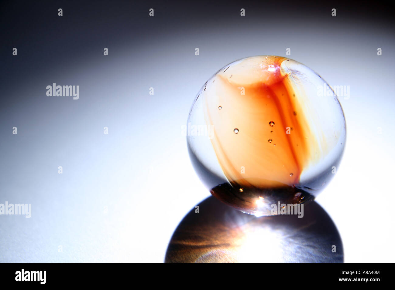 Marbles ball and its shadow Stock Photo - Alamy
