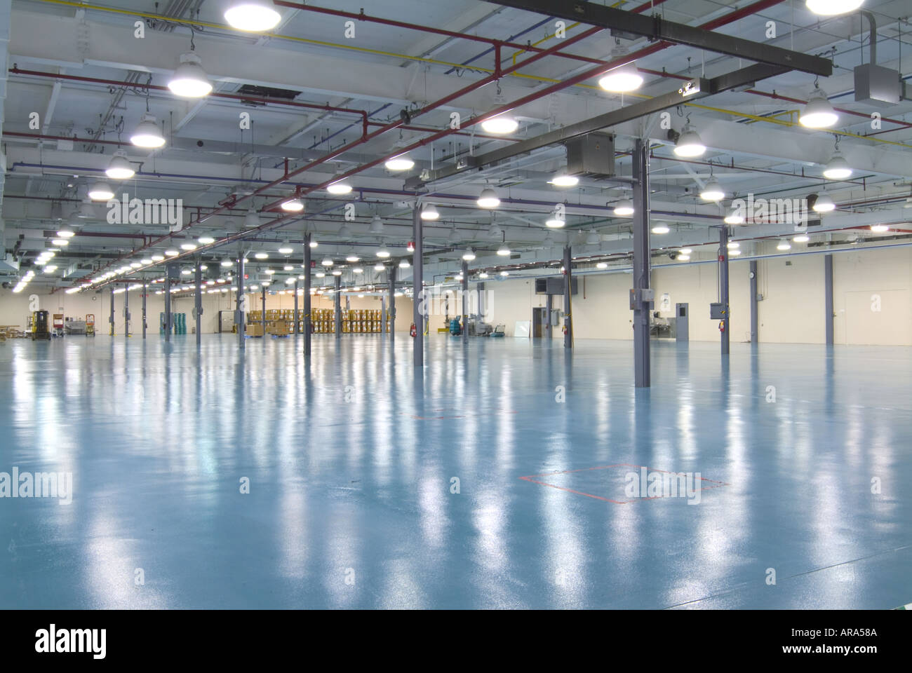 Empty Warehouse With Shiny Reflective Floor Stock Photo 1549705