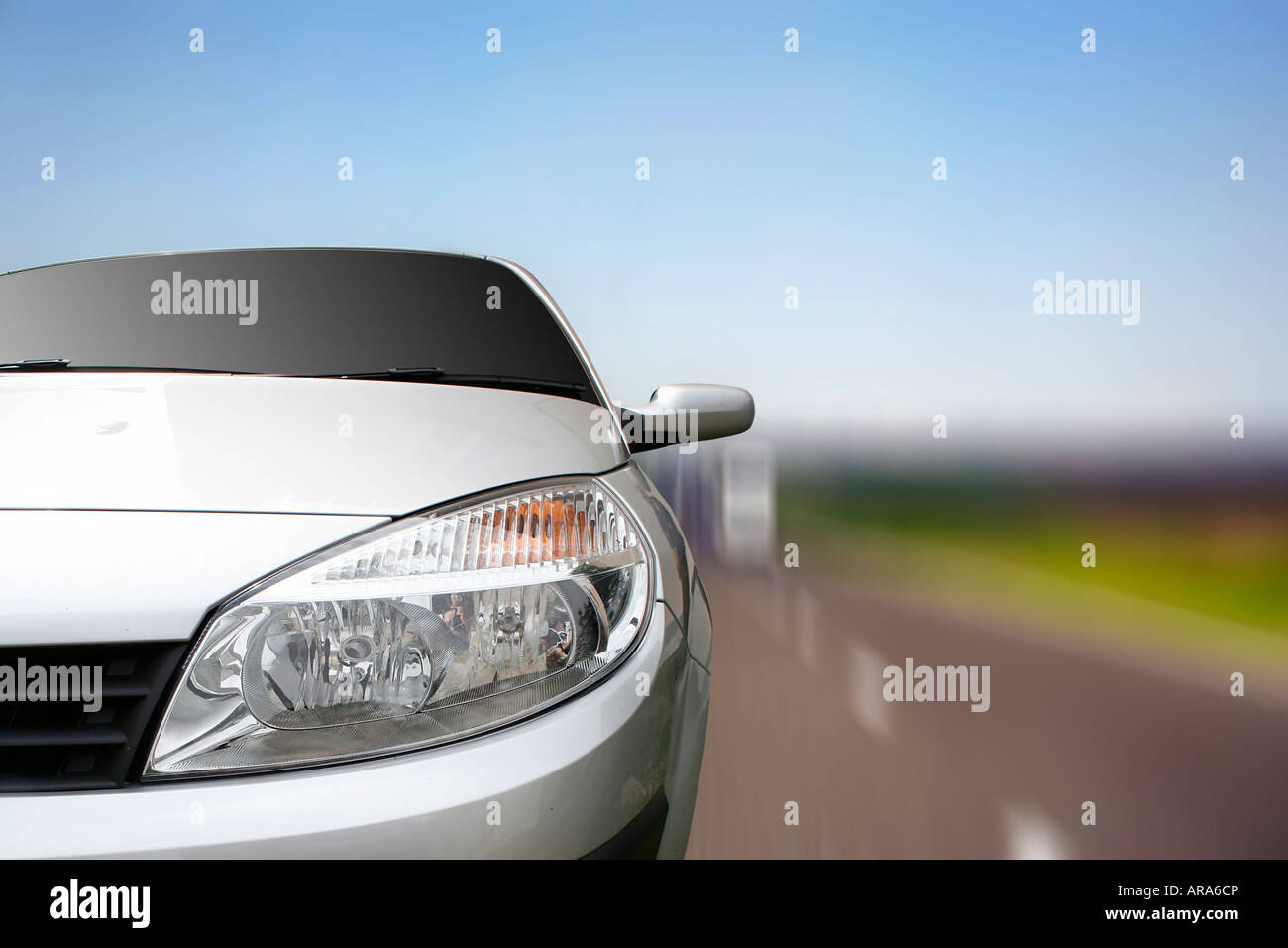 White car on the highway Stock Photo