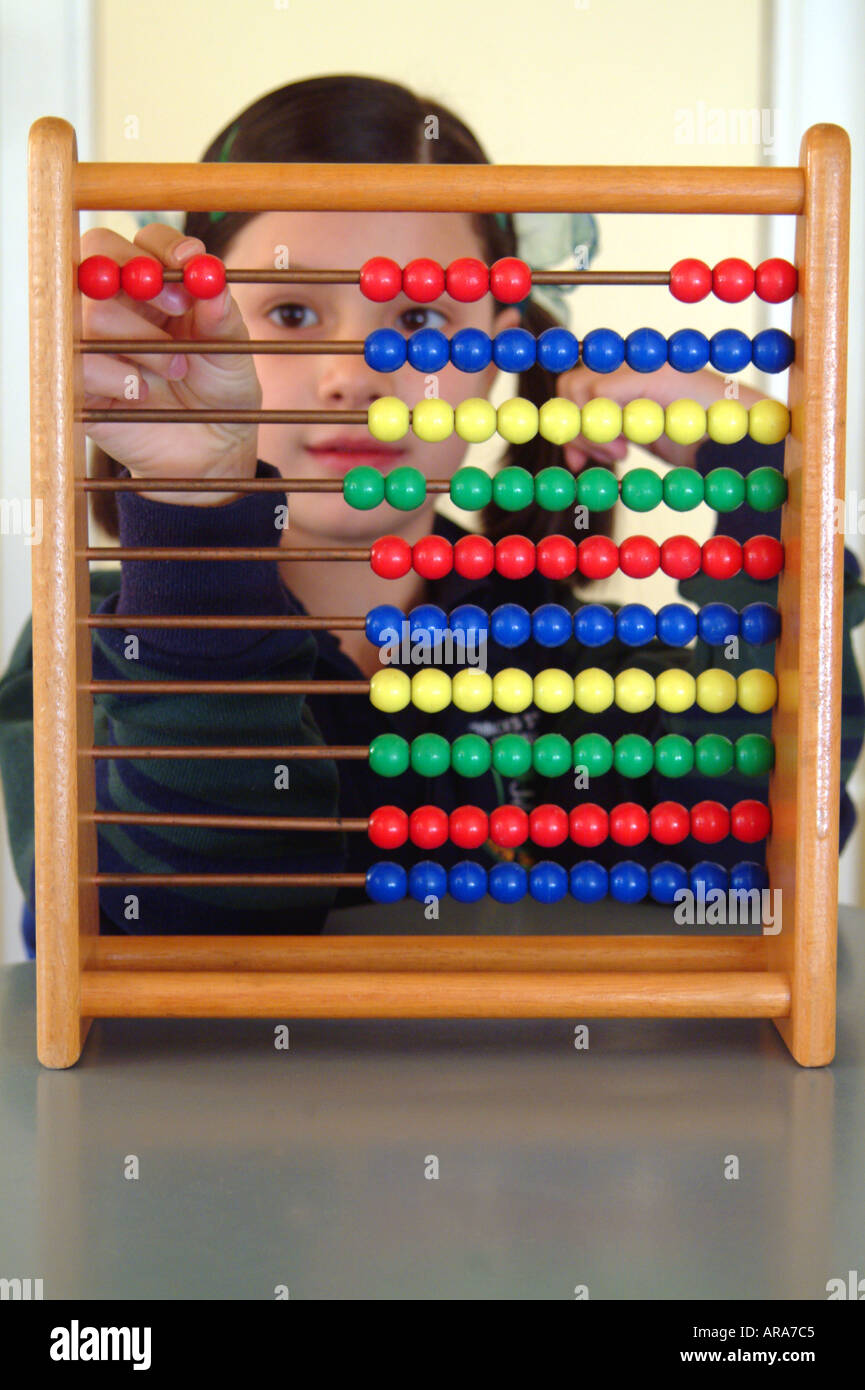 Child with counting frame Stock Photo Alamy