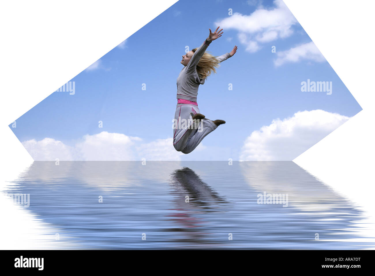 Happy woman jumping against blue sky Stock Photo - Alamy