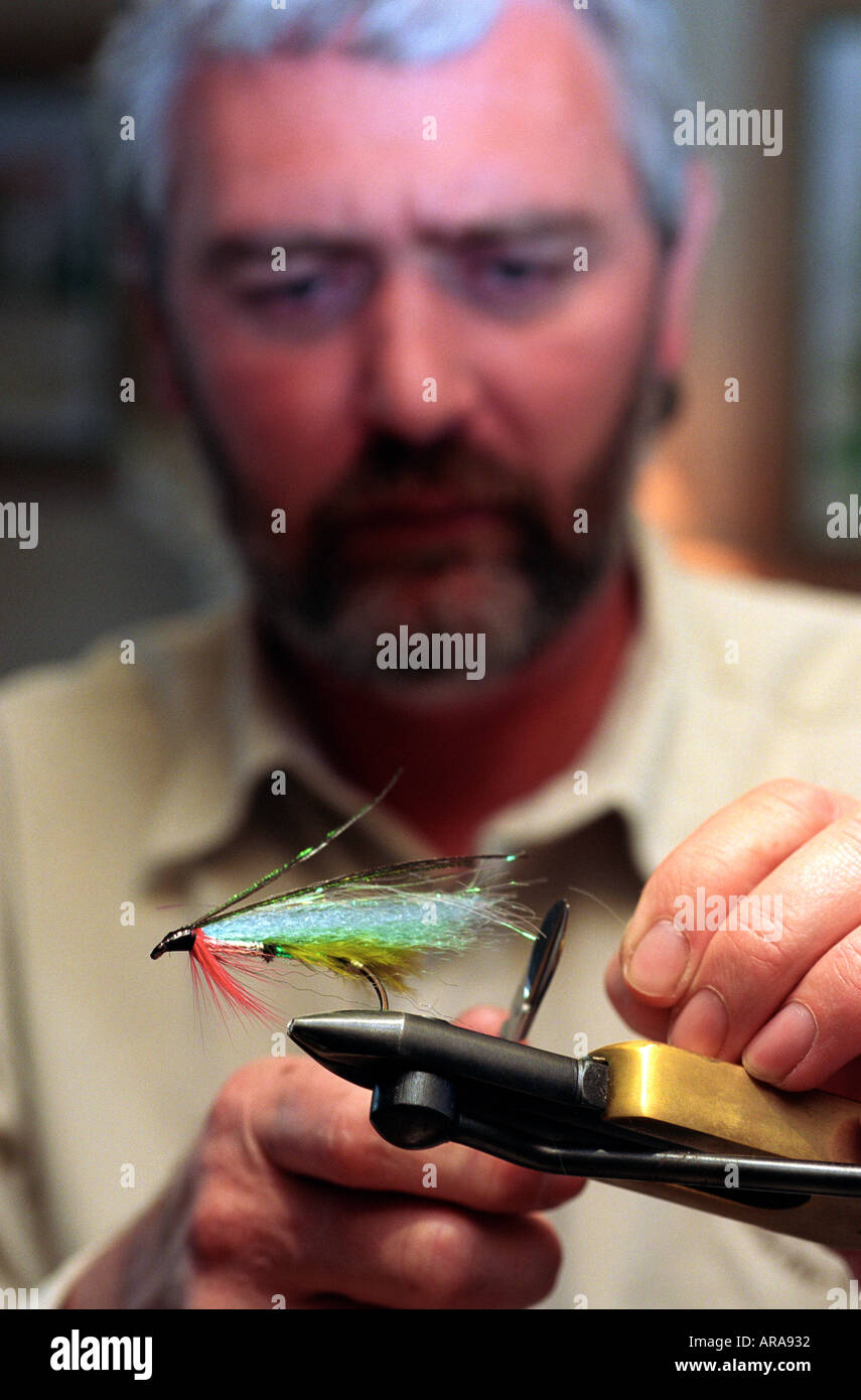Making a fly for fly fishing Stock Photo Alamy