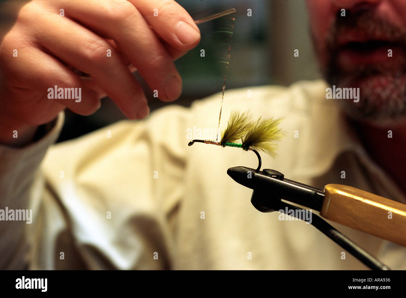 Making a fly for fly fishing Stock Photo Alamy