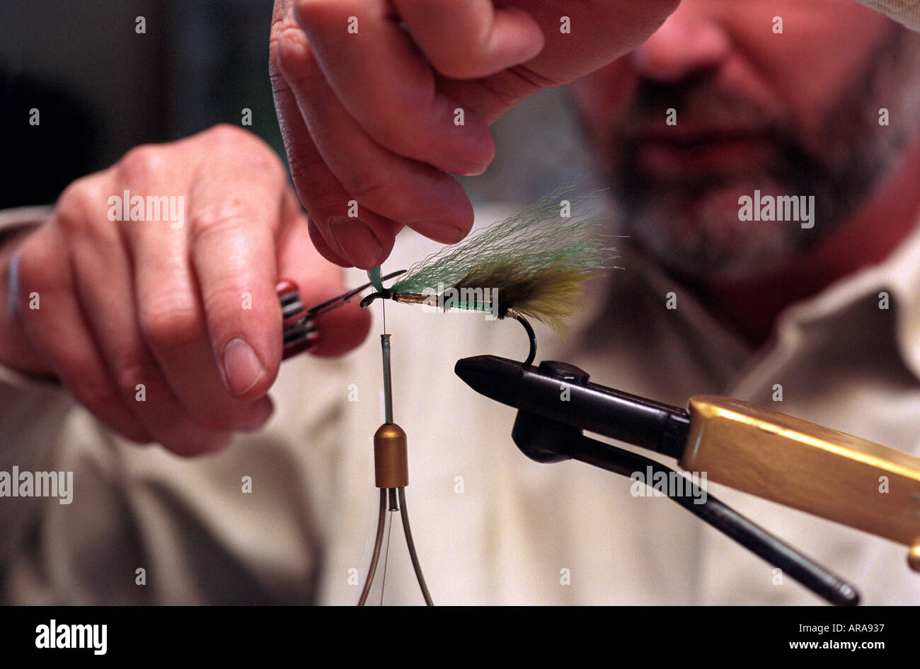 Making a fly for fly fishing Stock Photo - Alamy