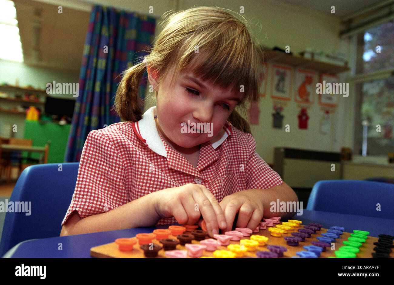 Five year old girl pupil at a Special School for children with visual impairments, Coventry, England. Stock Photo