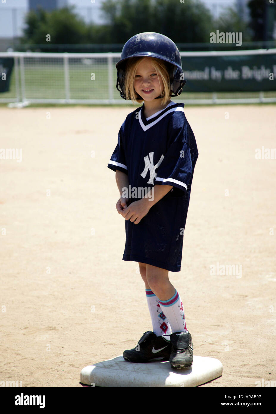 little girl playing baseball Stock Photo