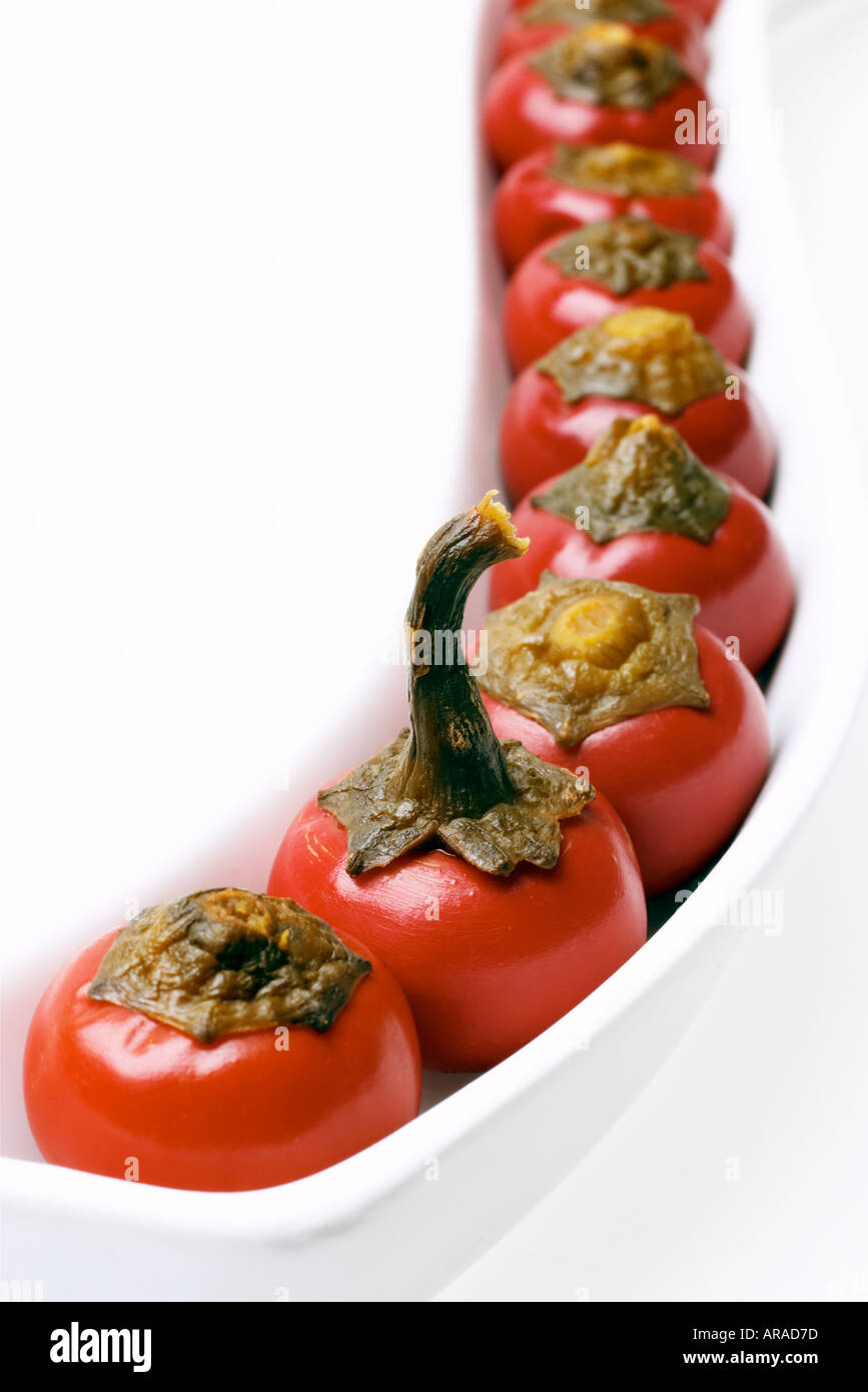 Cherry peppers in antipasti bowl Stock Photo