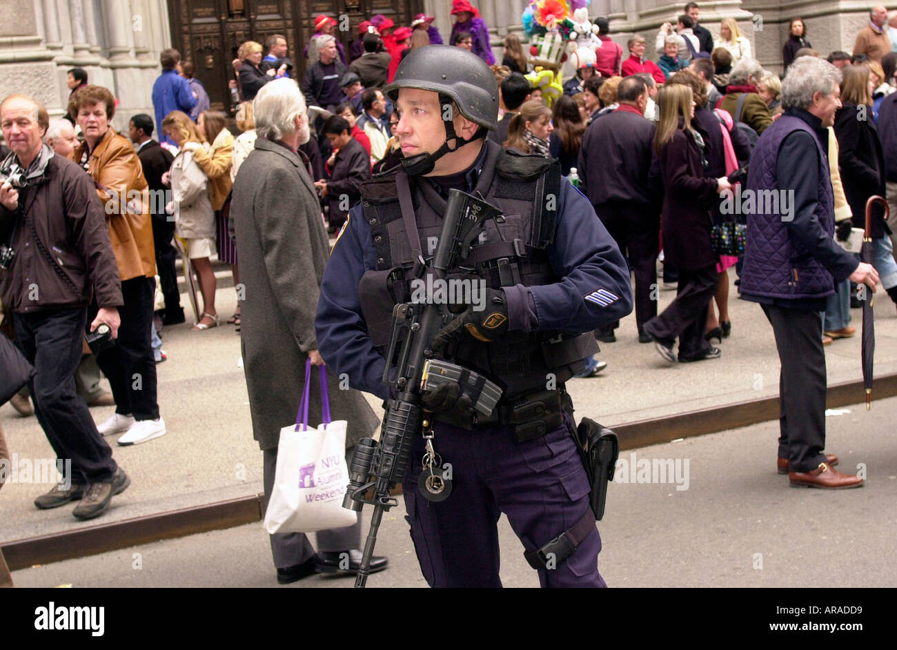 NYPD Emergency Services Unit officer stands guard outside St Patrick s Cathedral  Stock Photo