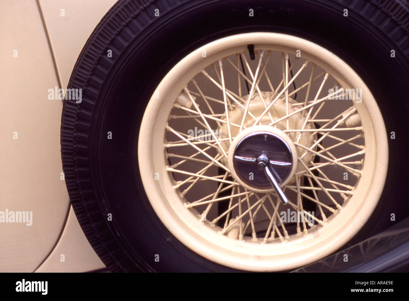 Wire spare wheel on running board of vintage Rolls Royce Stock Photo