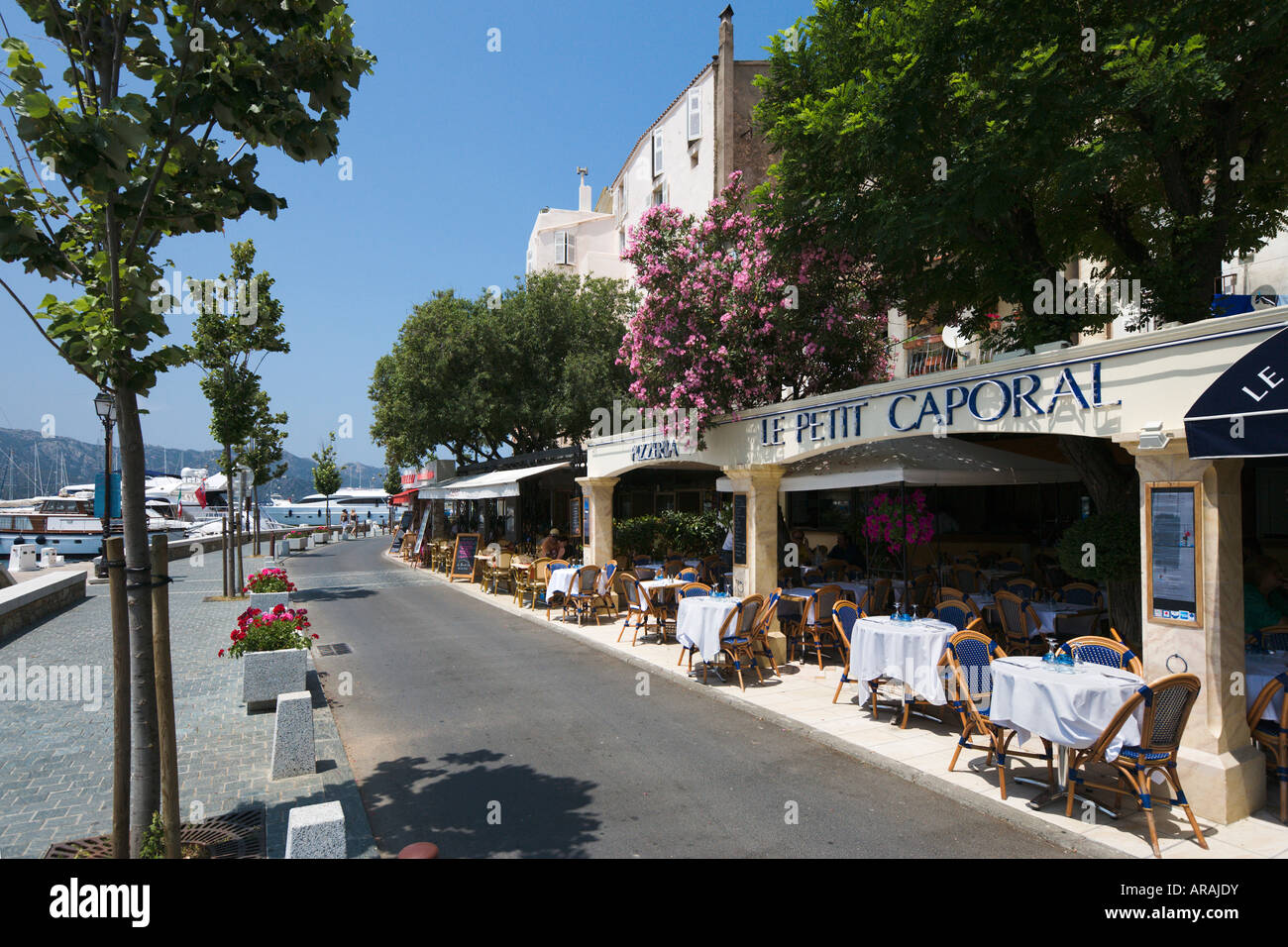 Harboufront restaurant, Place des Portes, St Florent, The Nebbio, Corsica, France Stock Photo