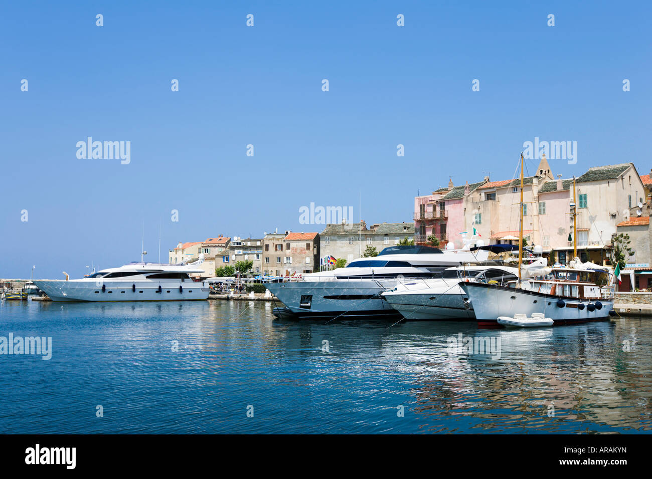 Luxury Yachts in the harbour at St Florent, The Nebbio, Corsica, France Stock Photo