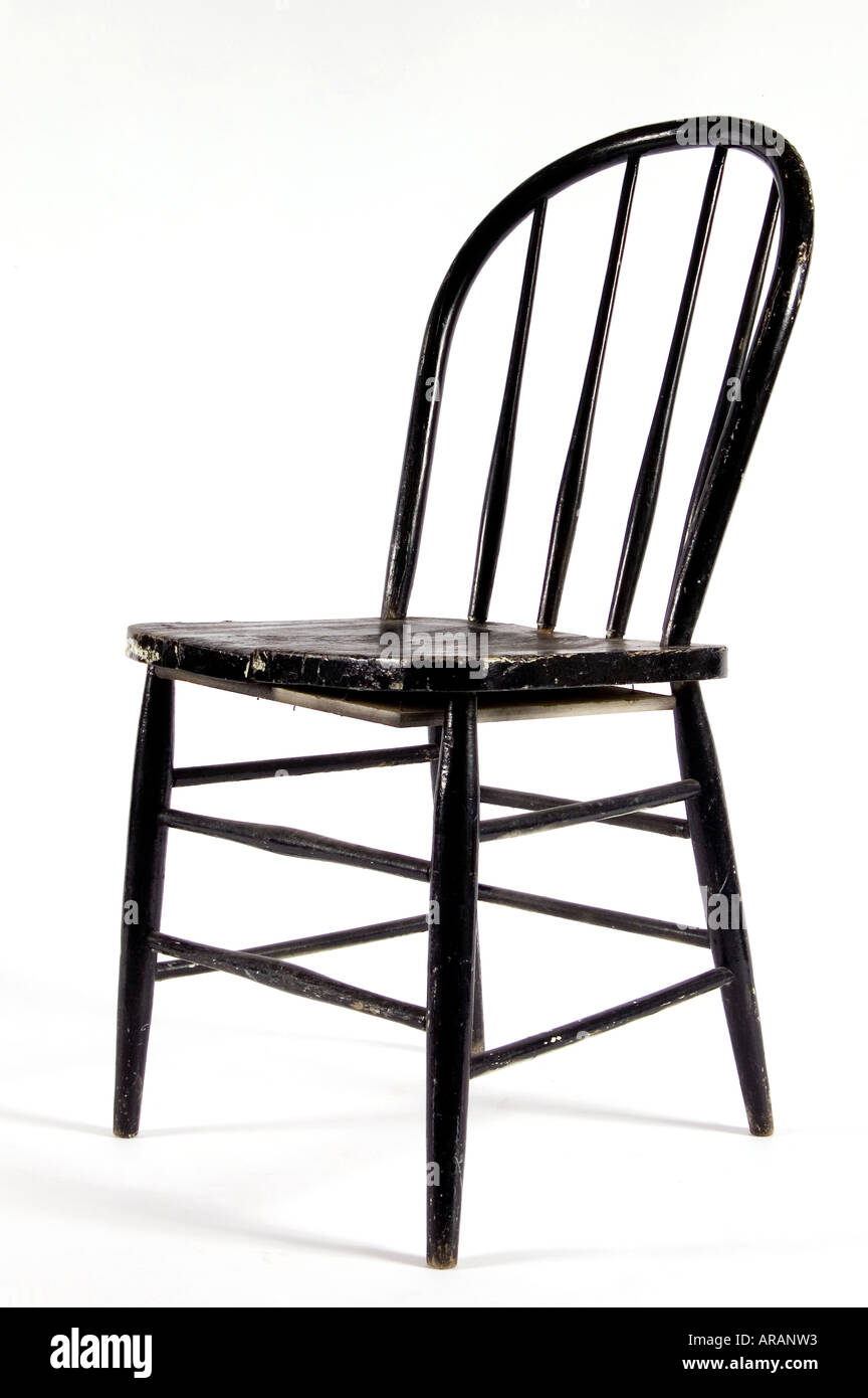Old antique black chair on a white background Stock Photo - Alamy
