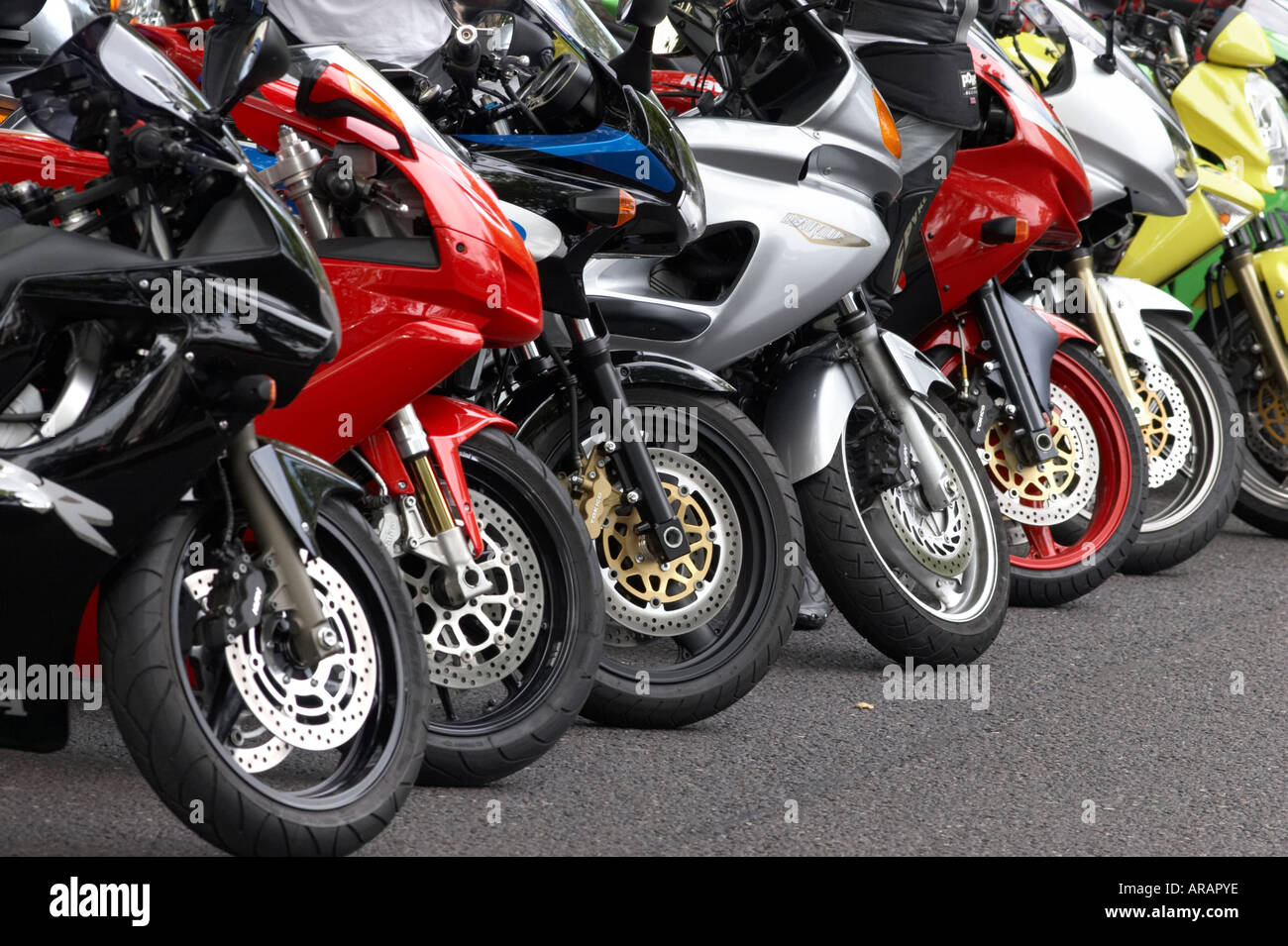 Row of parked motorbikes in London UK Stock Photo
