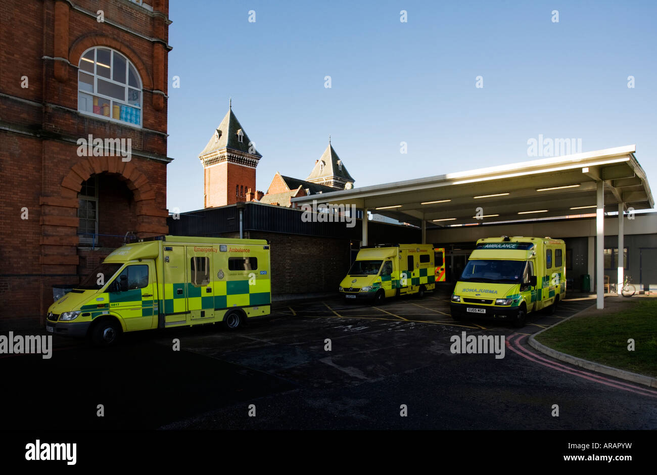 Ambulances in ambulance bay to the rear of Whipps Cross accident and emergency centre Stock Photo