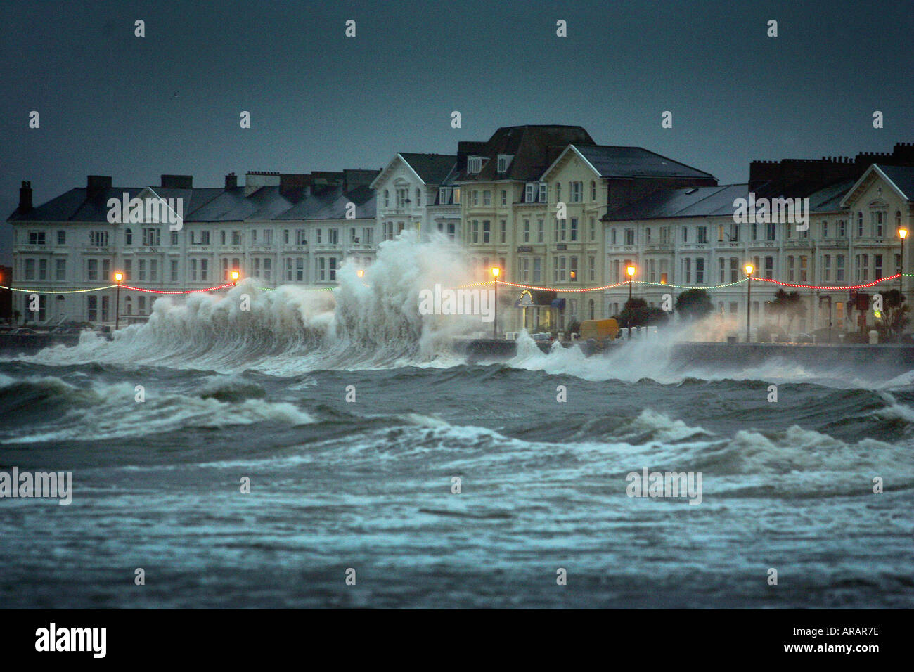 Stormy seas slam the sea wall at Exmouth south Devon England UK Stock Photo