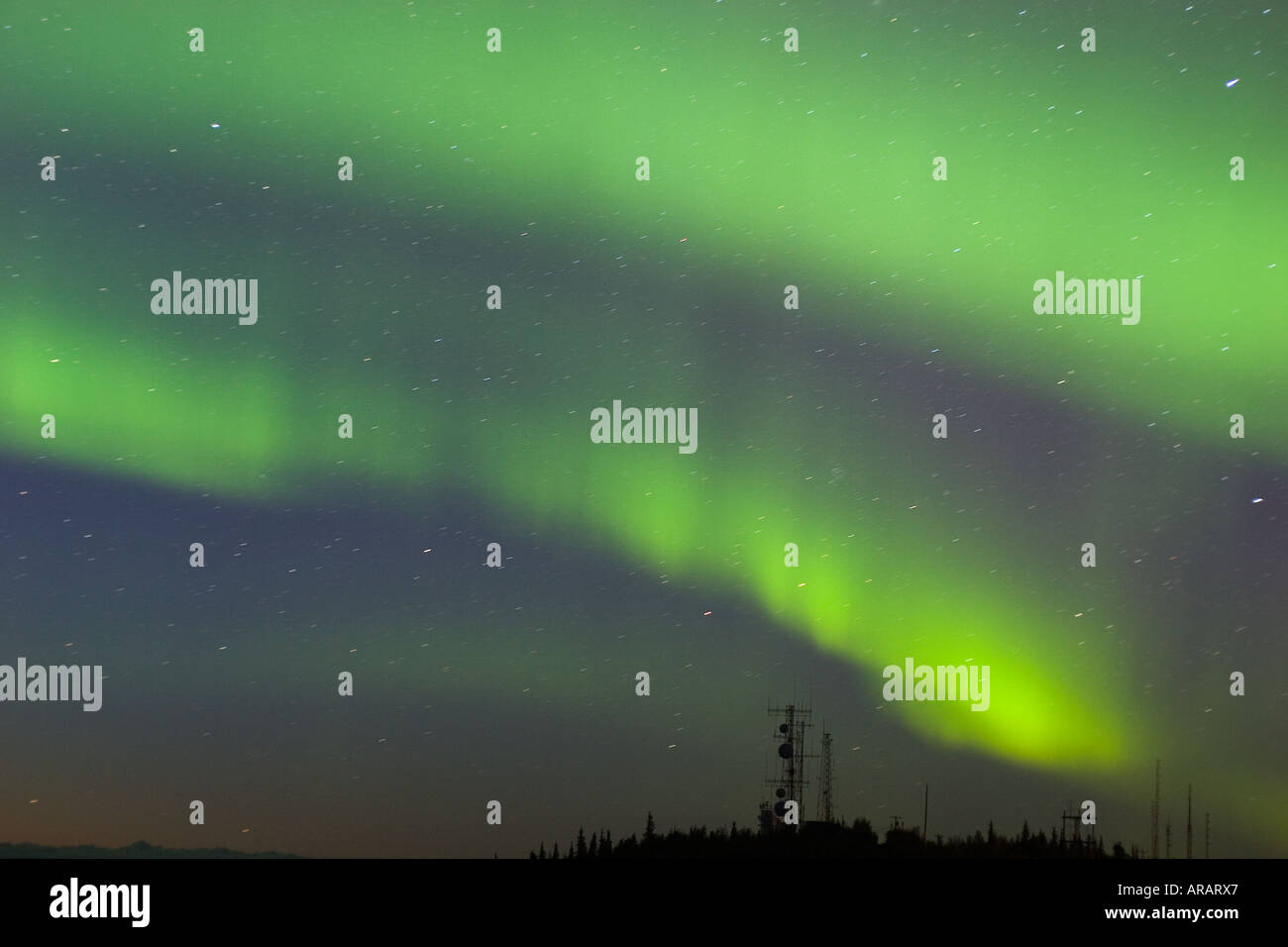 northern lights over antenna complex on the hilltop Stock Photo Alamy