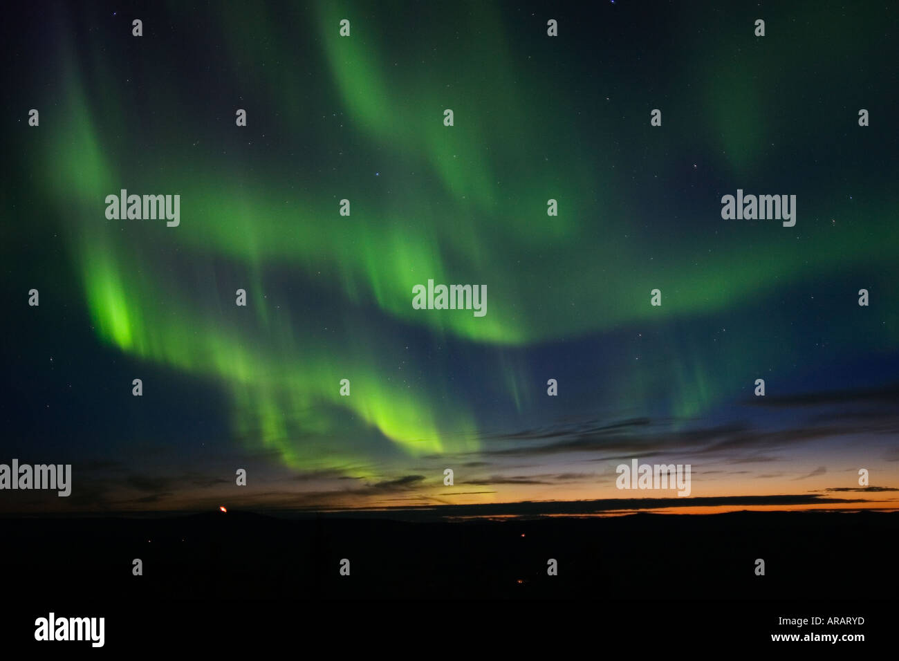 Twilight sky filled with aurora borealis Stock Photo