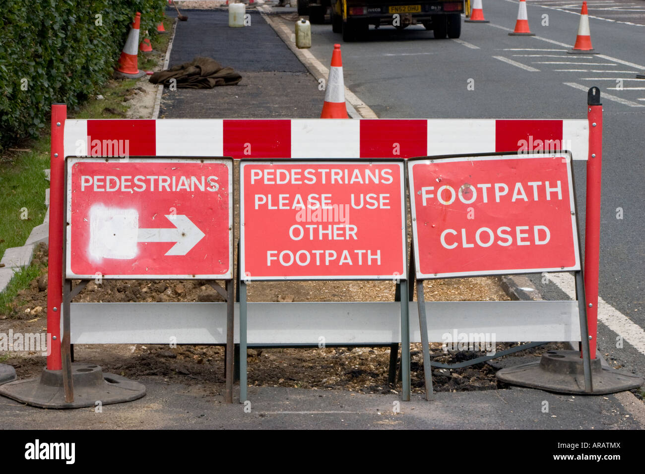 Footpath closed pedestrians please use other footpath road signs