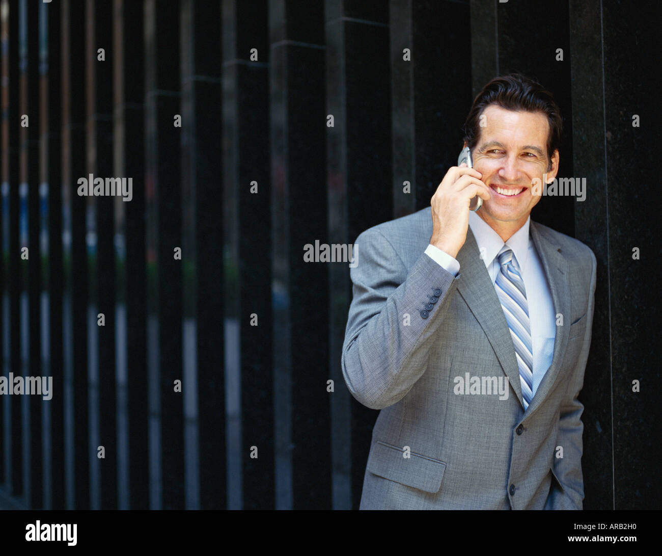 Businessman Using Cellular Phone Stock Photo