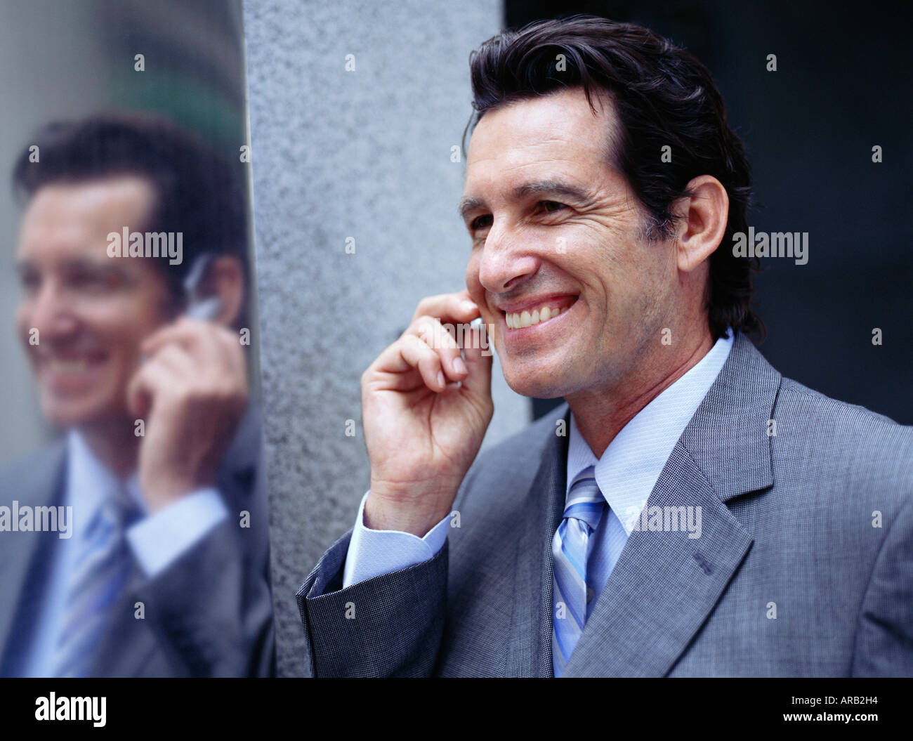 Businessman Talking on Headset Stock Photo