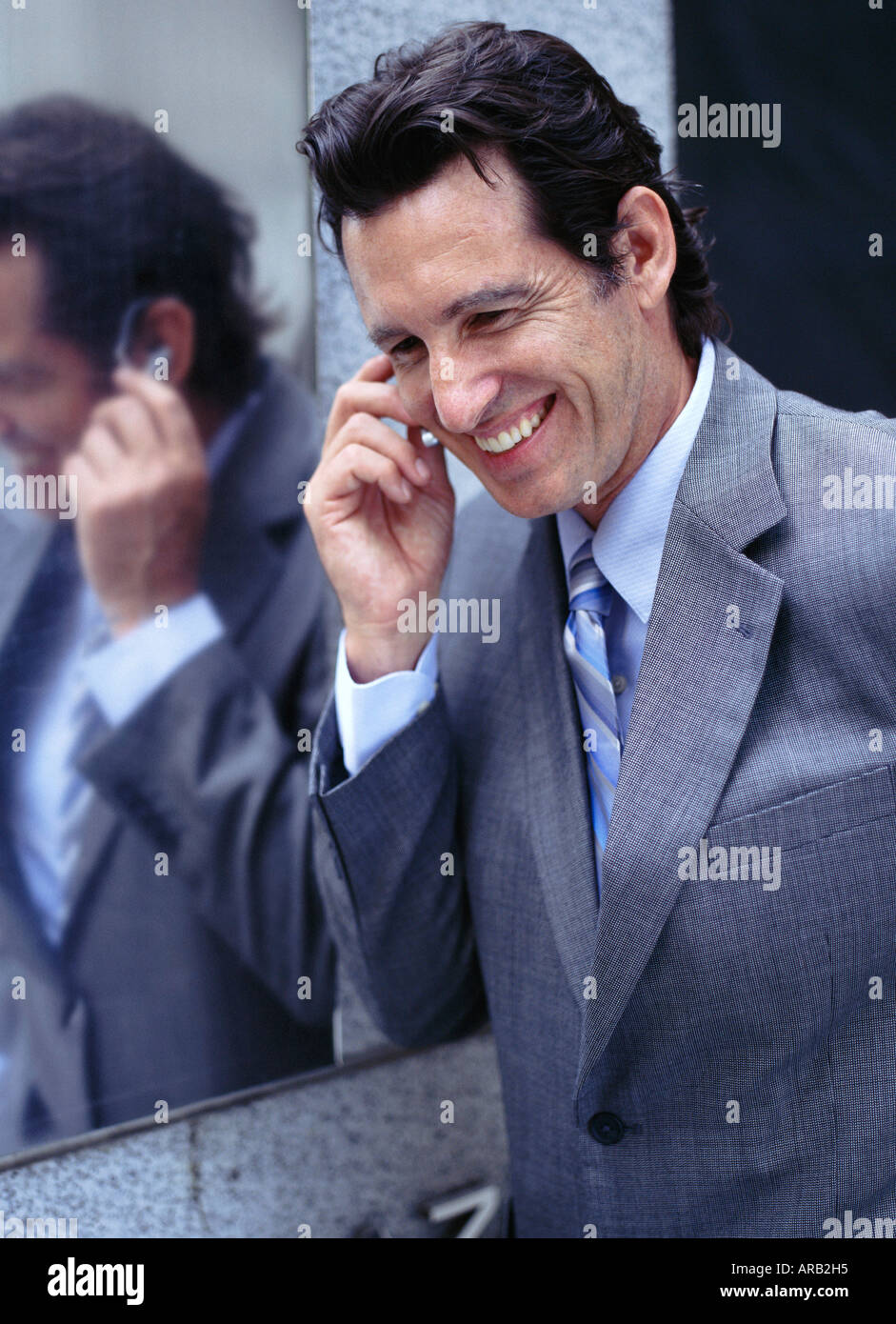 Businessman Talking on Headset Stock Photo
