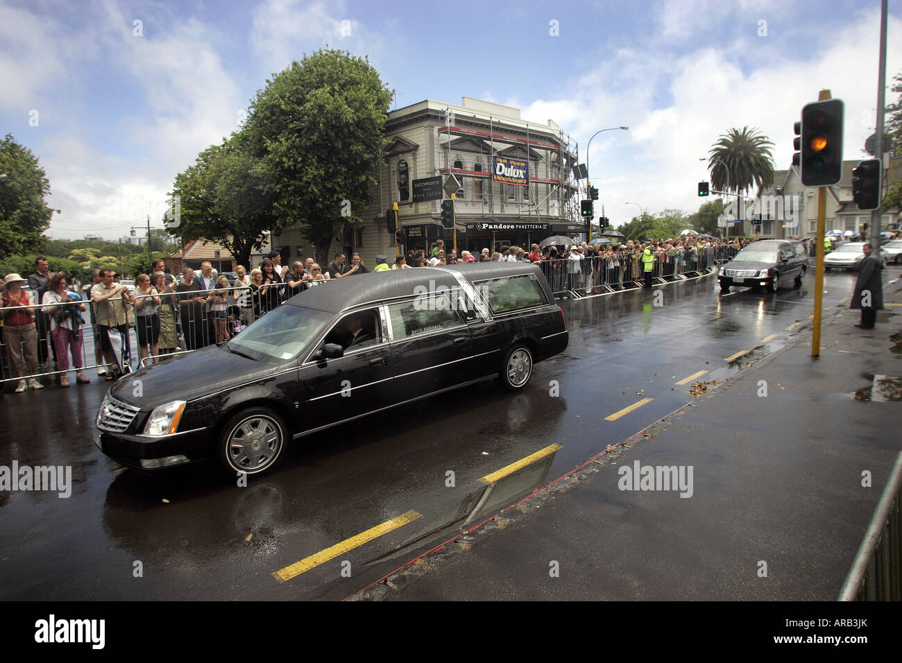 The cortege moves through the streets of Parnell after Sir Edmund Hillary's state funeral in Auckland New Zealand Stock Photo