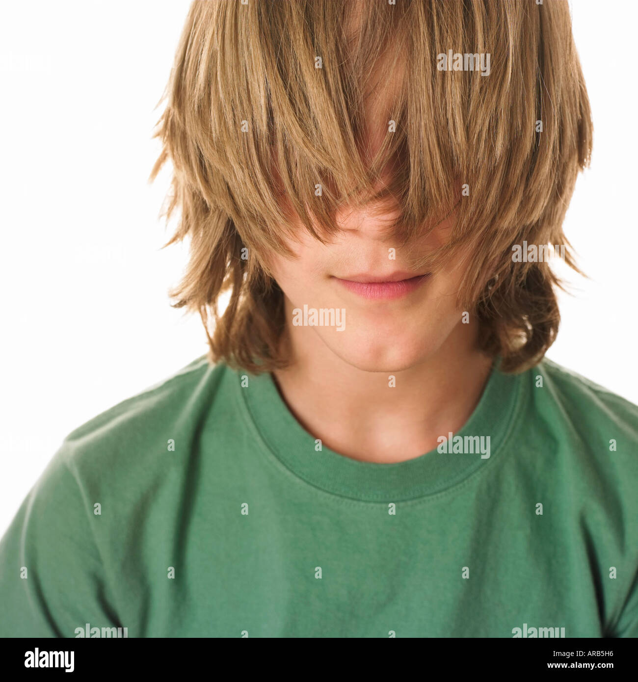 Teenaged Boy With Hair Covering Face Stock Photo Alamy