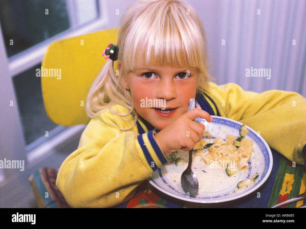 three-year-old-girl-eating-mr-stock-photo-alamy