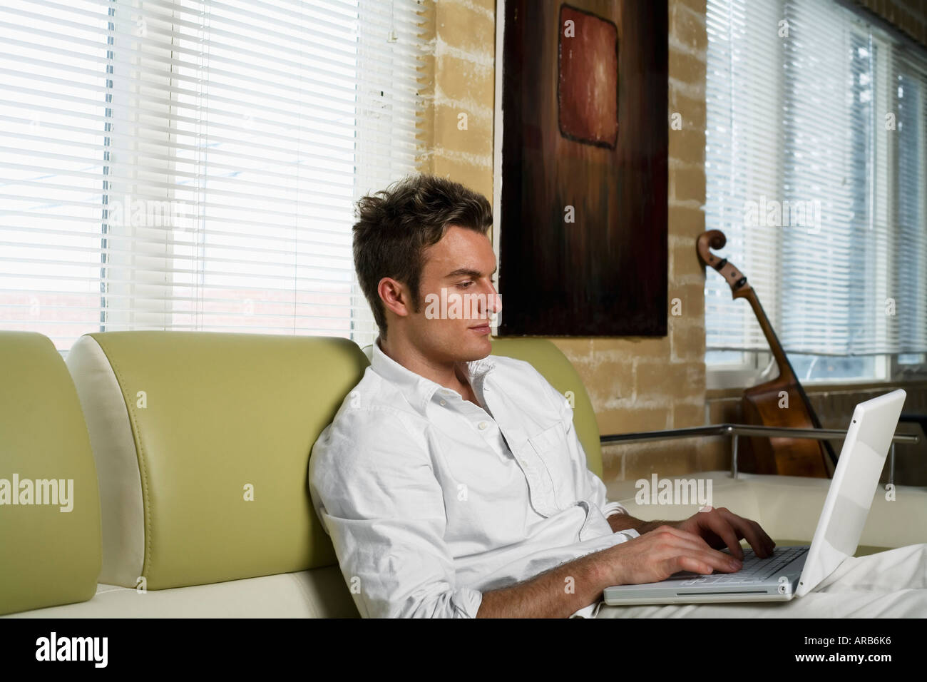 Man Using Laptop Stock Photo