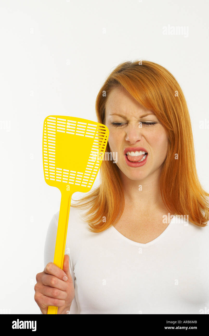 Woman Holding Fly Swatter Stock Photo Alamy