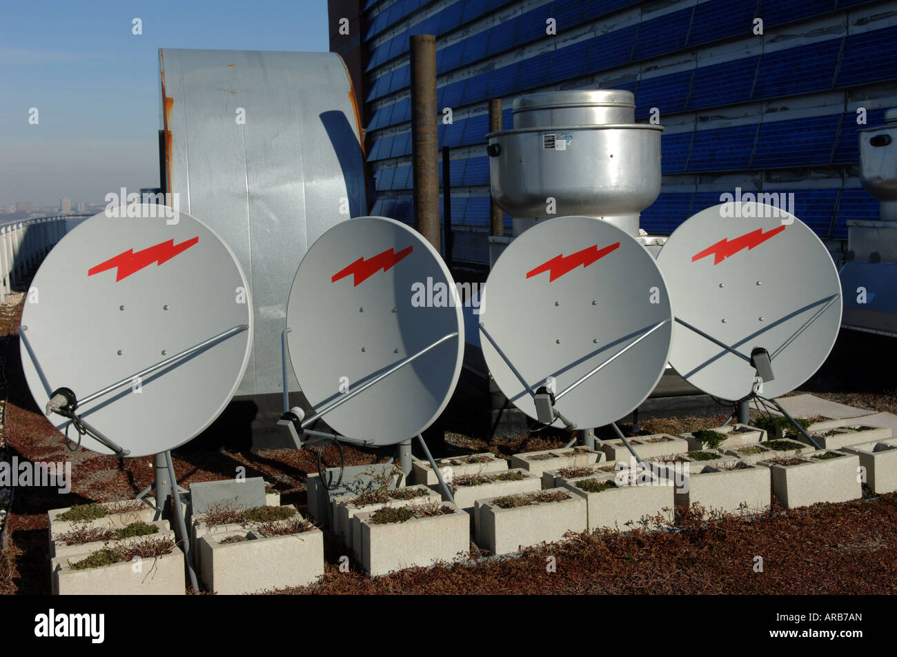 Satellite dishes on the green rooftop of the Solaire a green building in Battery Park City in NYC Stock Photo