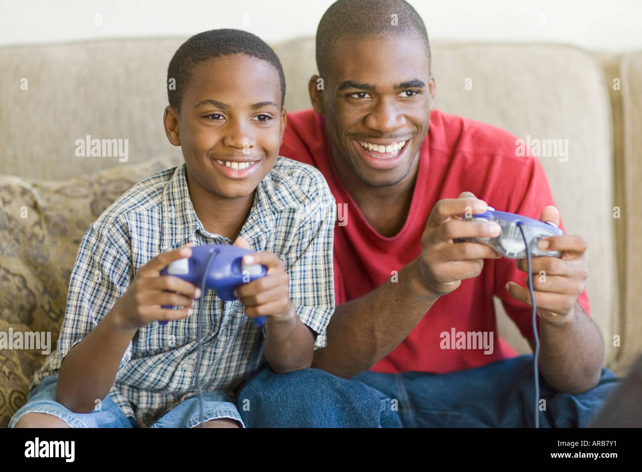 Brothers Playing Video Game Stock Photo Alamy