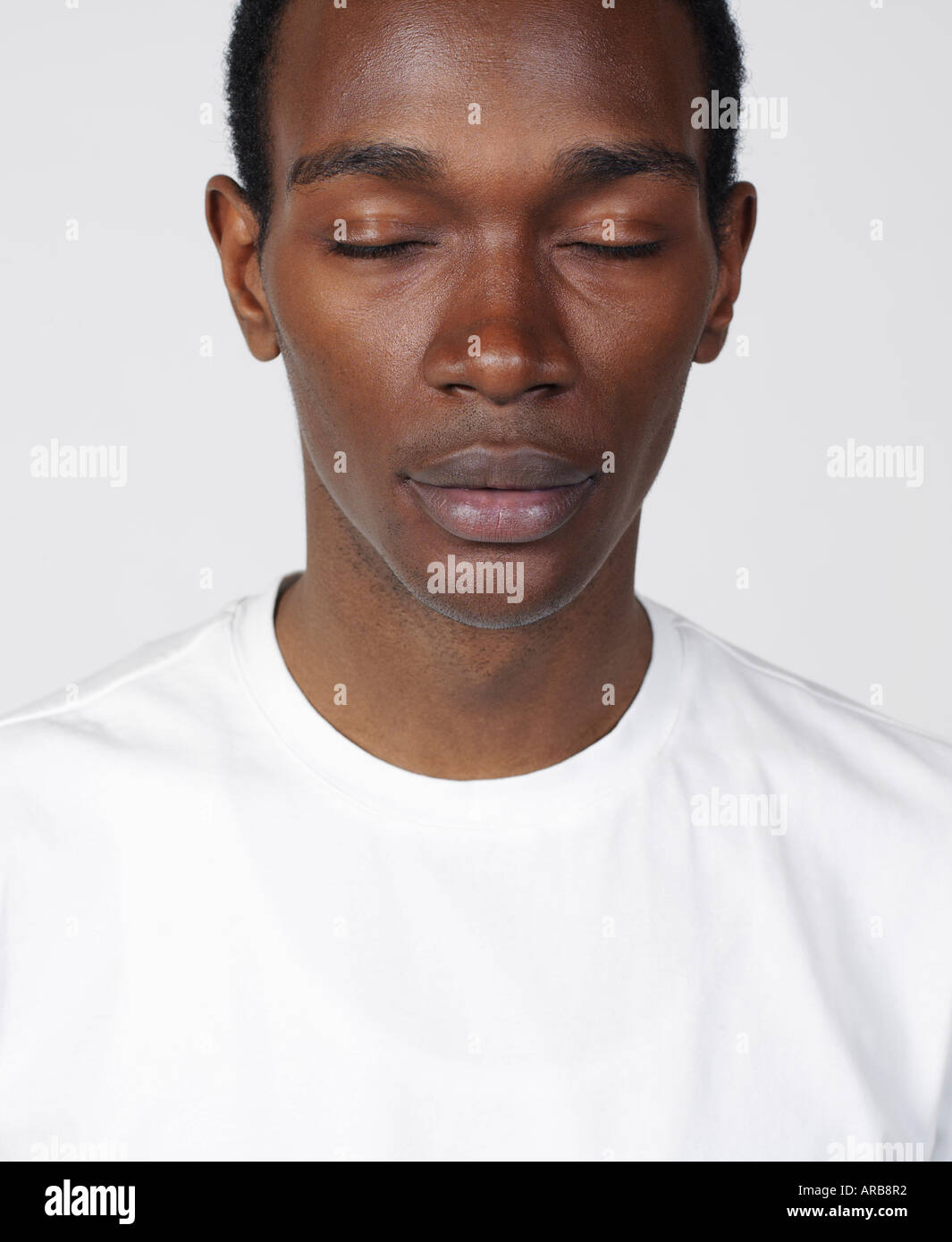 Black Man Eyes Shut Face High Resolution Stock Photography and Images ...