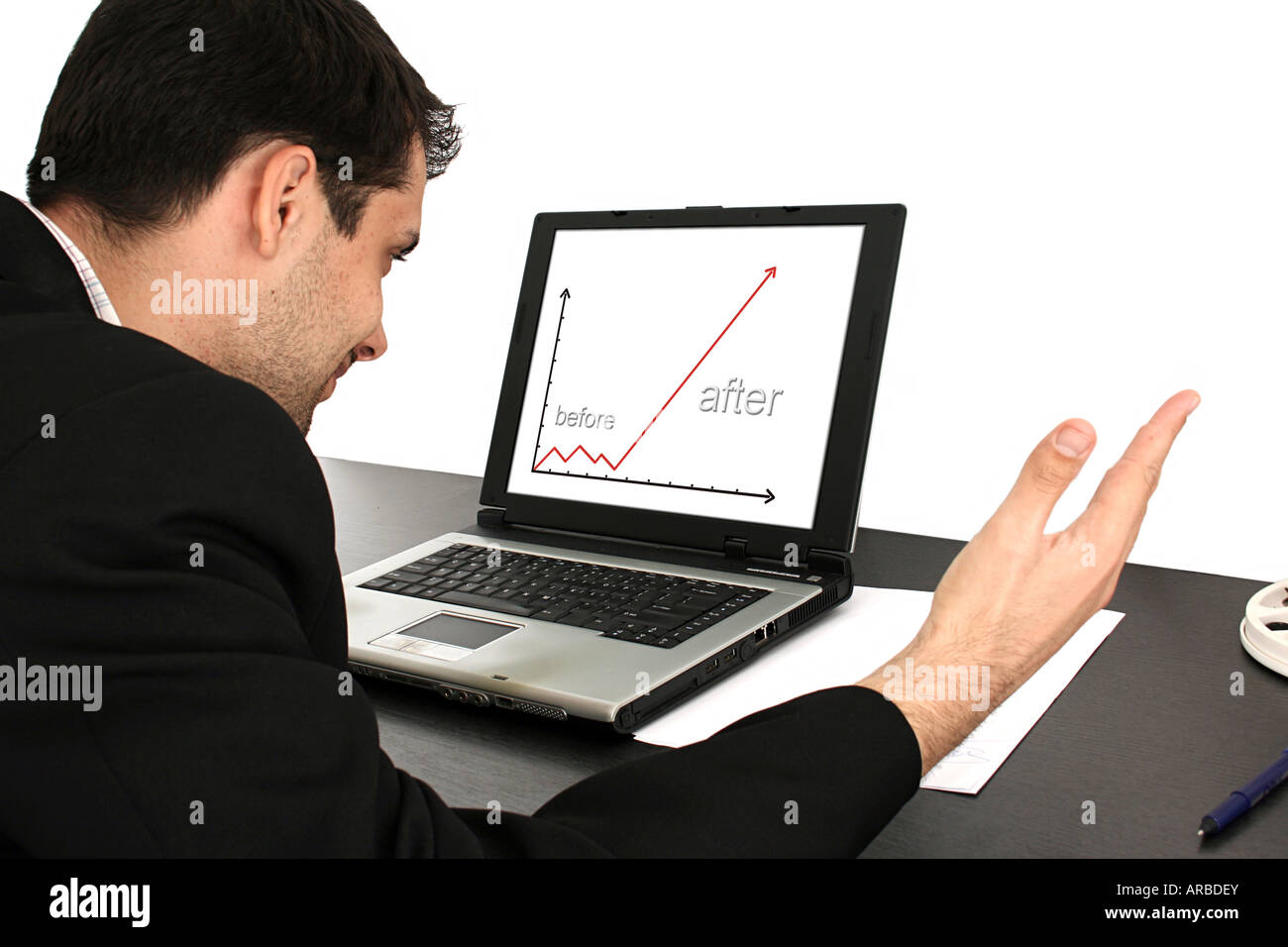 Businessman looking graphics on computer hi-res stock photography and ...