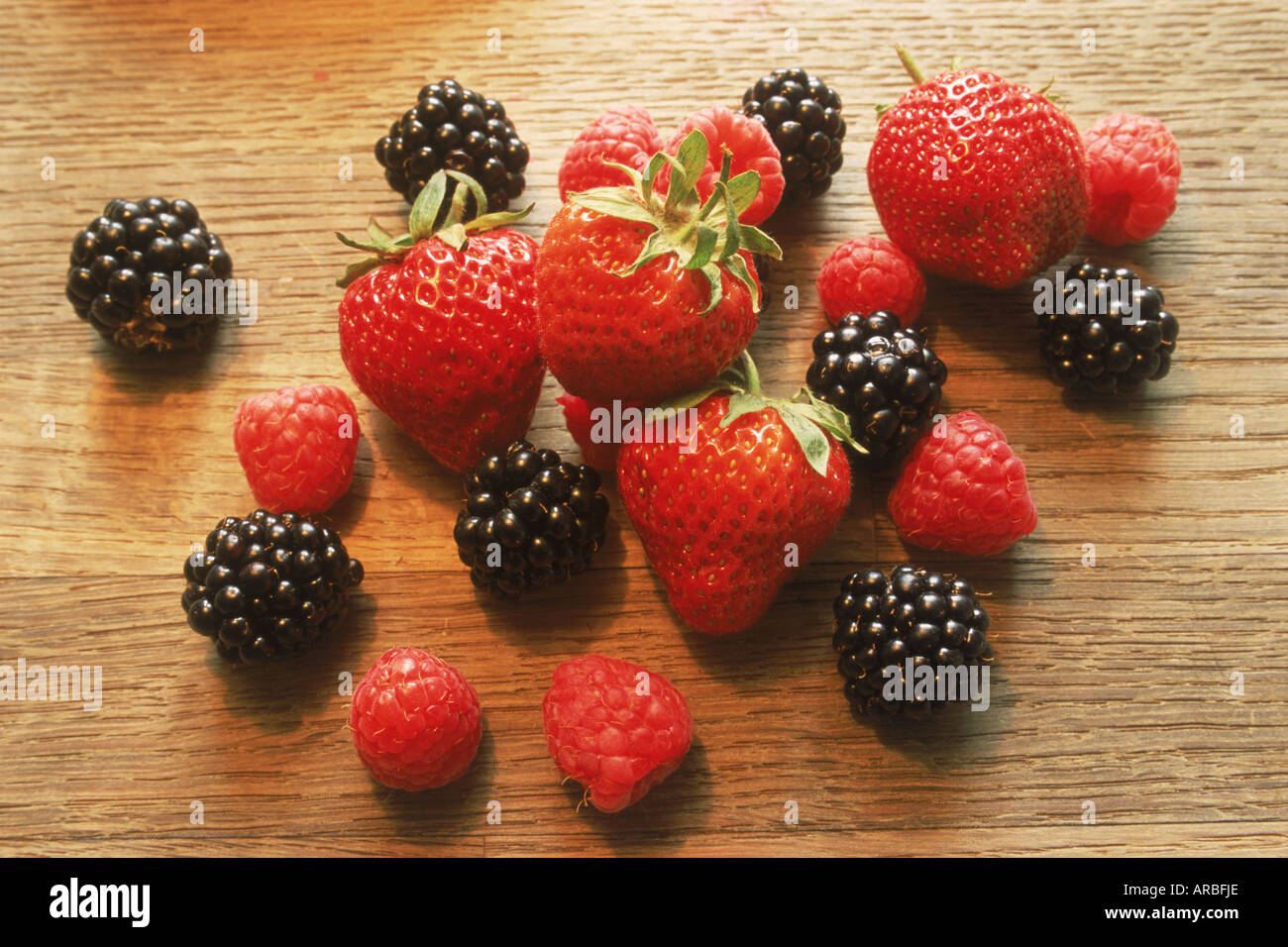 Raspberries, strawberries and blackberries Stock Photo
