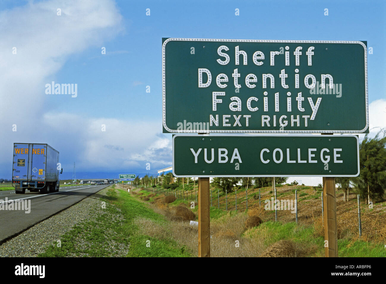 Higher education or imprisonment offered in one sign along California highway Stock Photo
