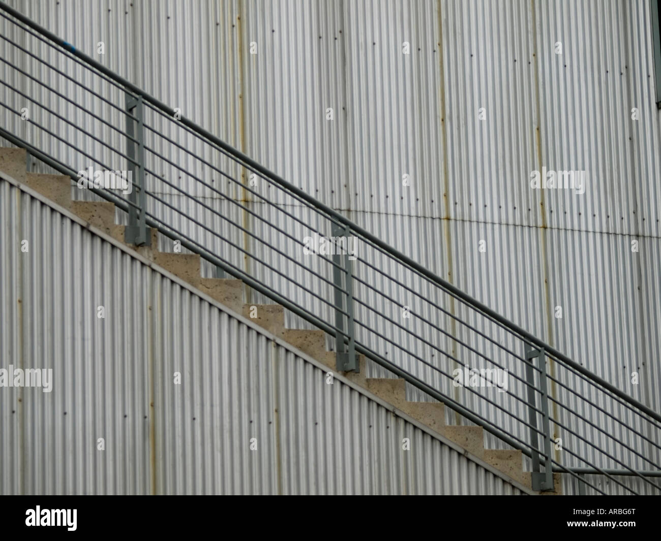 Metal walled building with staircase Stock Photo