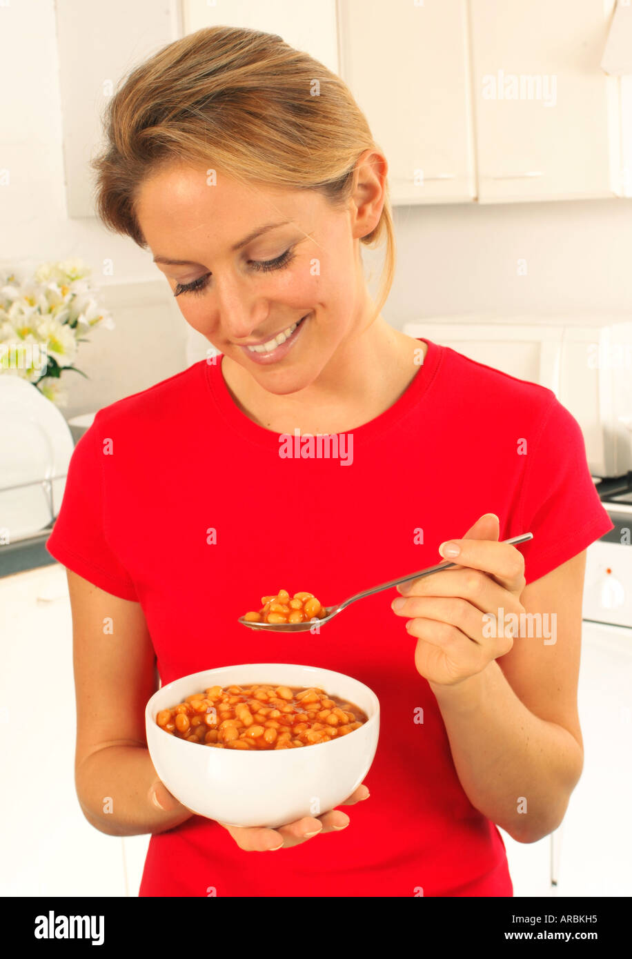 Girl eating baked beans hires stock photography and images Alamy