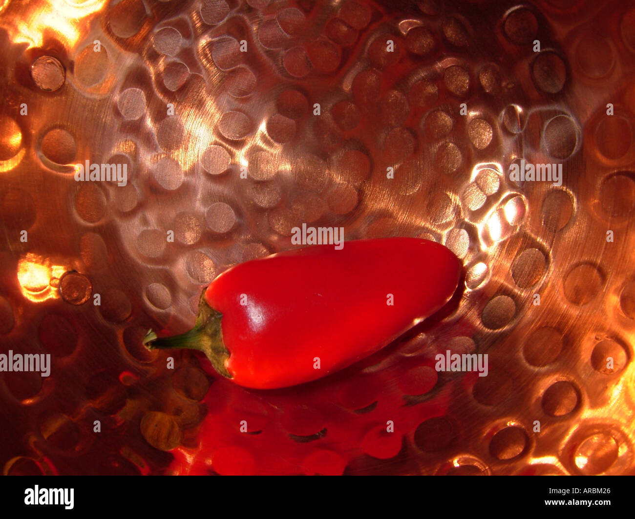Red pepper in a copper bowl Stock Photo Alamy