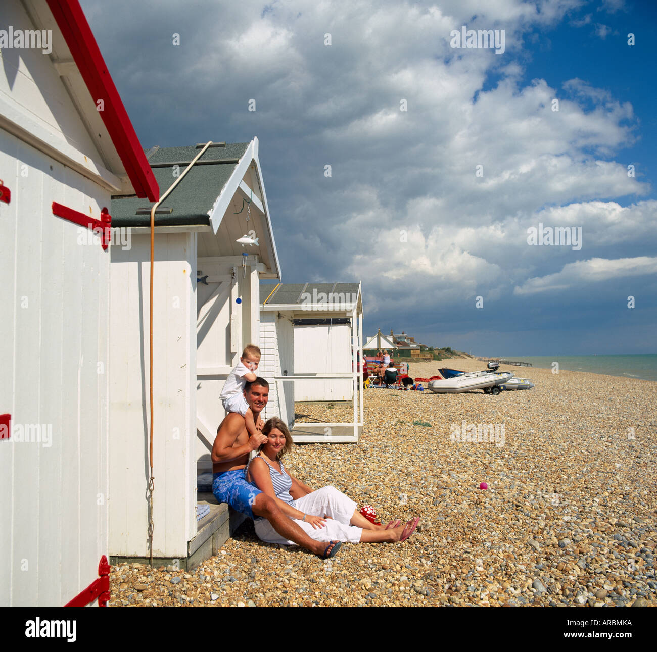 Young family vacationing beach hi-res stock photography and images - Alamy